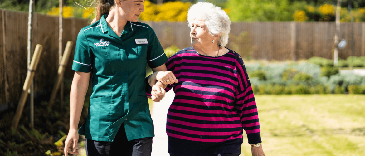 Nurse and resident discussing the early signs of dementia
